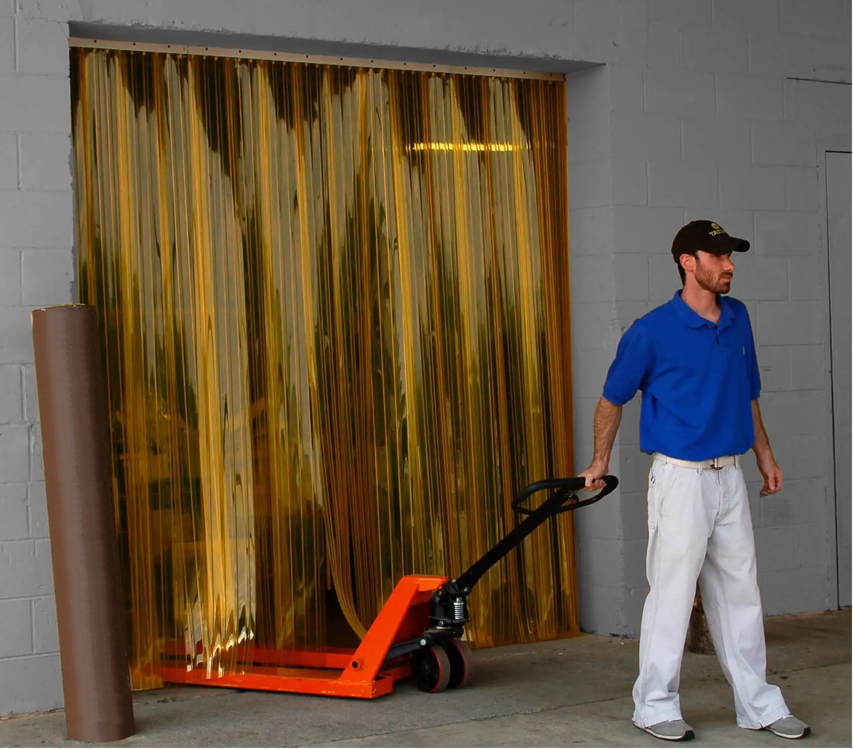 ribbed yellow PVC strip curtain with pedestrian traffic with anti-insect strips to keep pests out your premises
