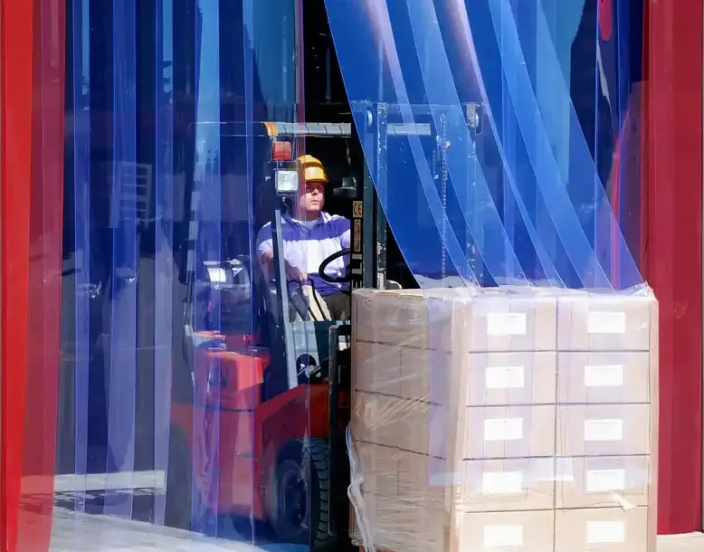 Forklift driving through clear PVC plastic strip curtains with transparent red side strips