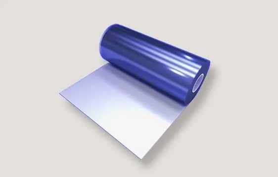 PVC clear sheet rolled up on its side with a grey background