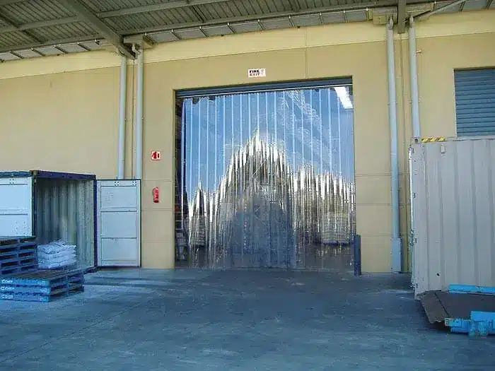 Fire retardant curtains in a warehouse doorway