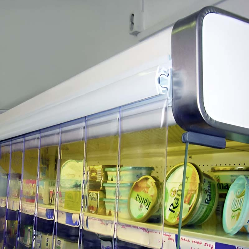 Chiller Blinds in a retail grocery shop fridge door. These Chiller Cabinet Blinds are perfect for insulating fridges in grocery stores.