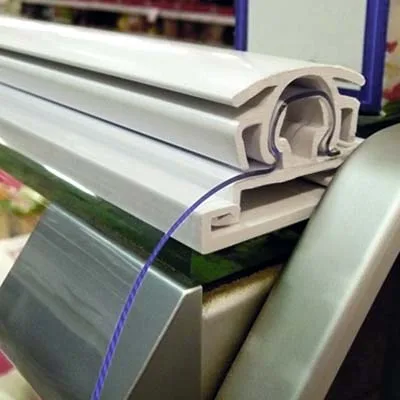 PVC Sheet Chiller Kits in a retail grocery shop fridge door. These can also be called sheet chiller blinds